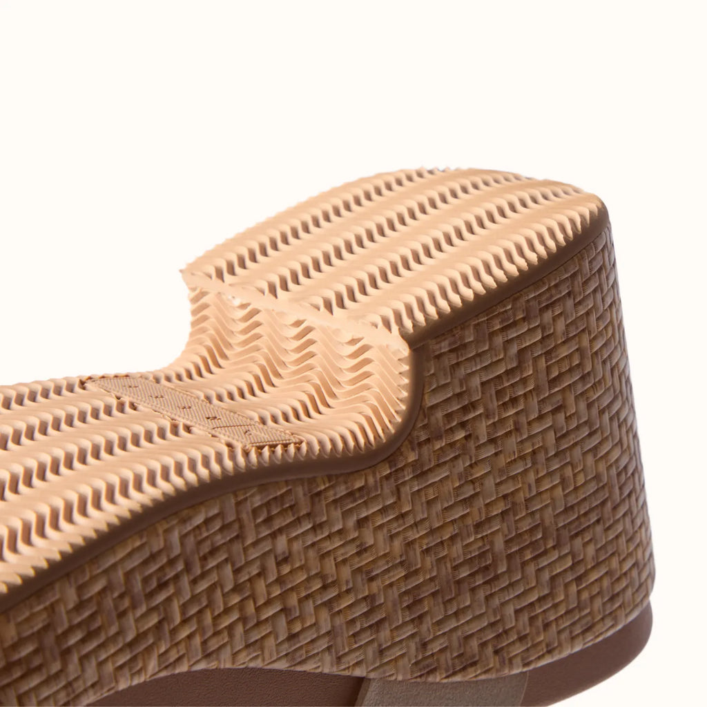 Sunset Ibiza x Jenny close-up of tan woven platform sole facing right with textured tread and soft-rebound cushioning