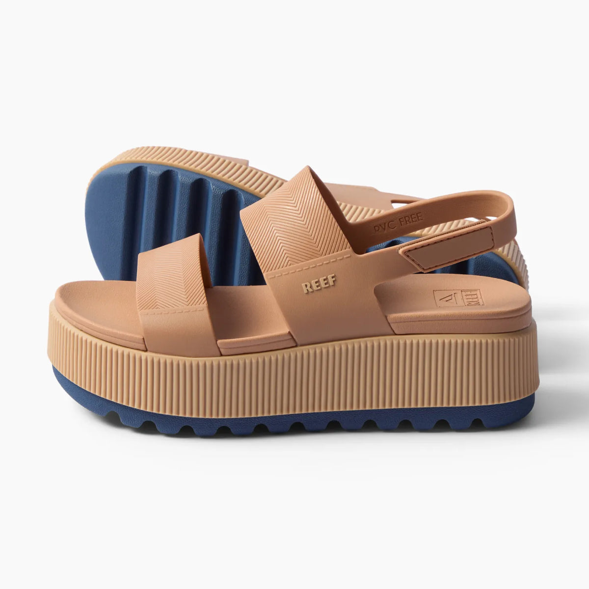 Water Vista Higher sandal facing right in tan with navy sole, adjustable back strap, cushioned platform, and water-friendly design