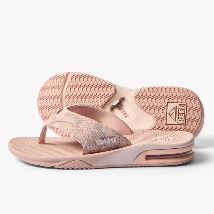 Side view of Fanning sandal in soft rose camo with arch support, soft cushioning, and water-friendly sole by REEF.