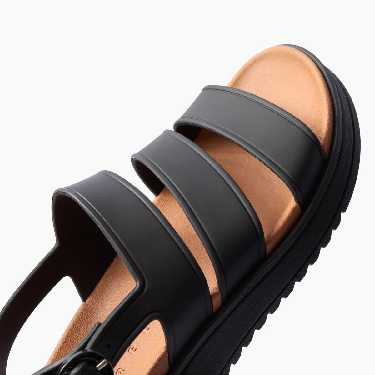 Vista Marbella black three strap sandal with toe facing upper right close up of cushioned footbed and arch support