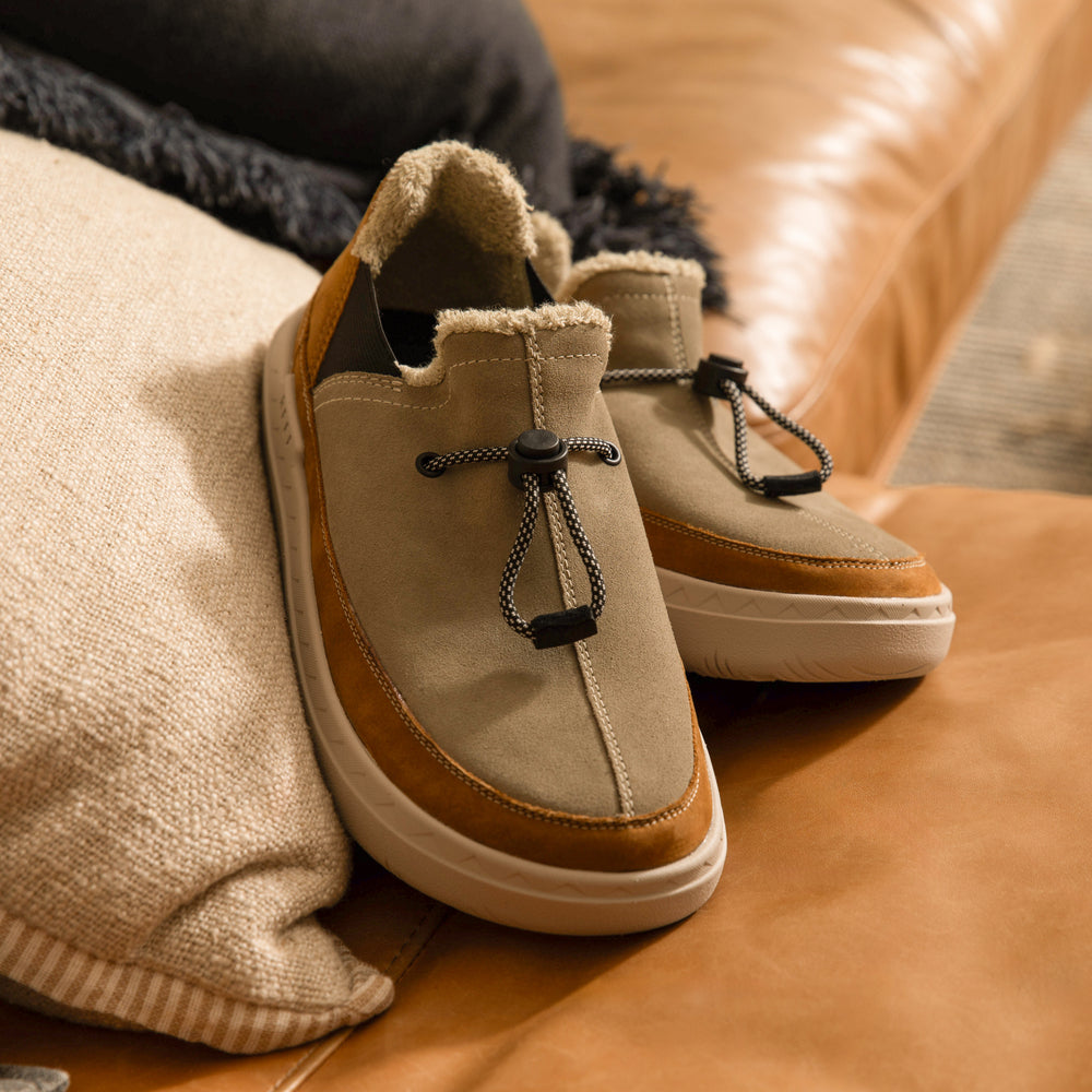 Rambler shoe facing right, close-up of front and side with water-friendly materials and cushioned sole for comfort.