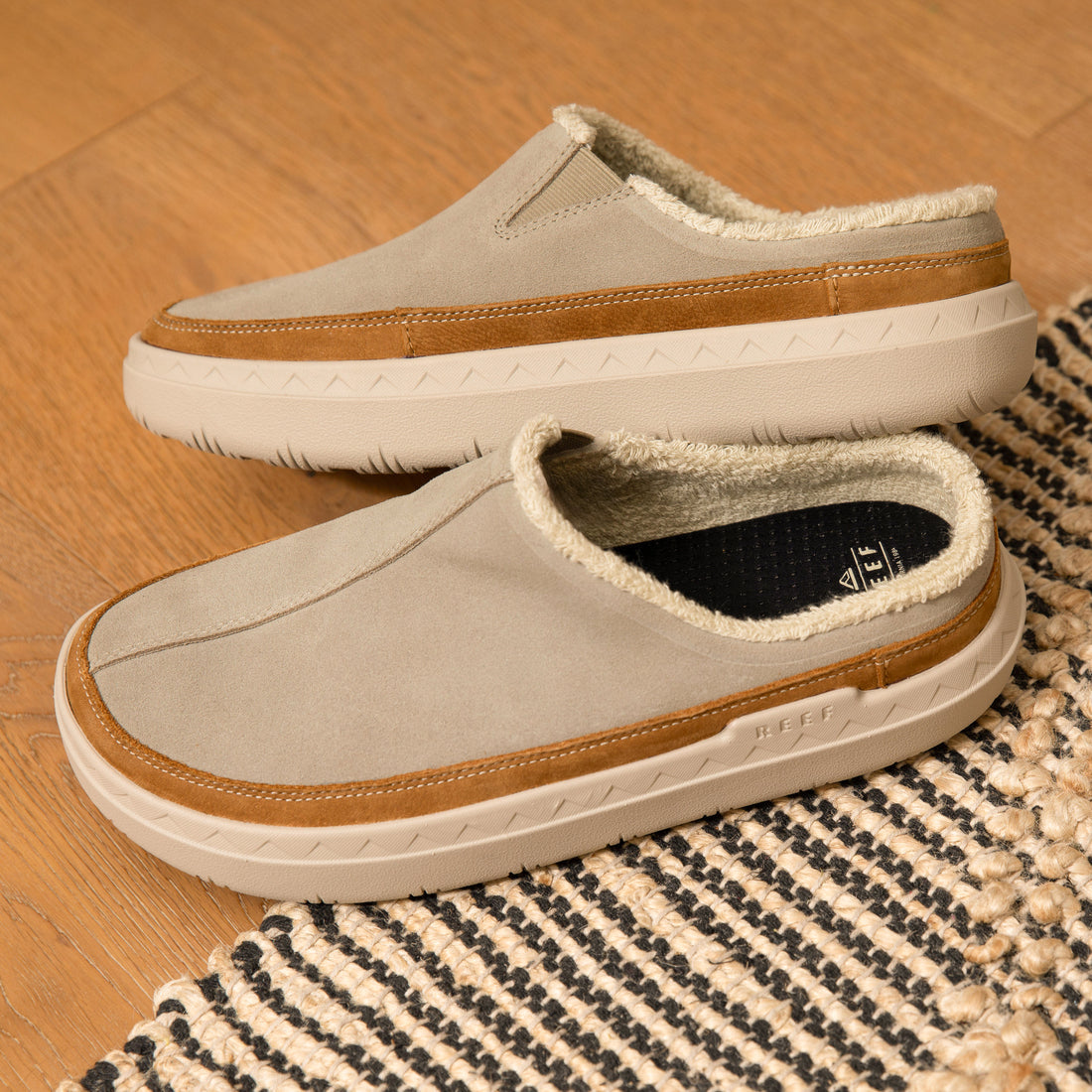 Pair of Rambler Mule Brown placed on a carpet with a top and side view