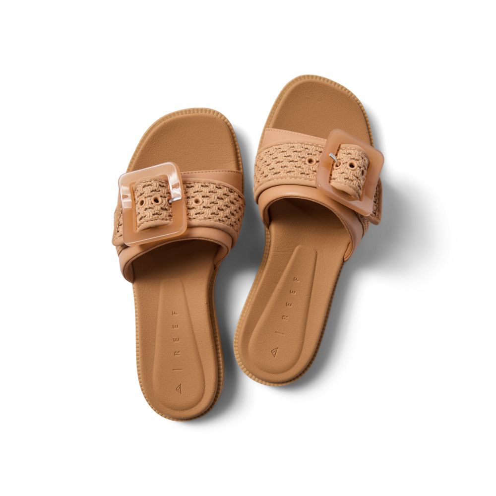 Sunny Emma women's sandals facing upward, featuring natural textile strap with a large buckle, soft cushioning, and arch support.