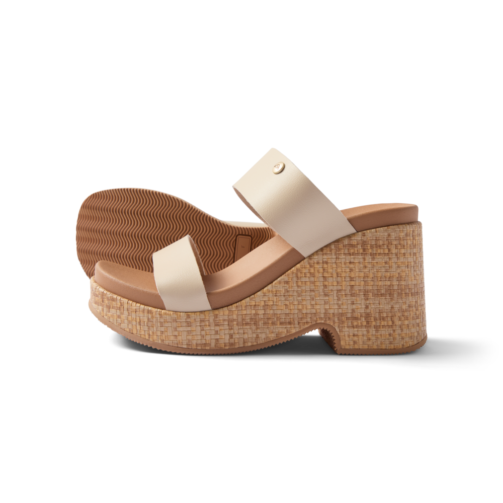 Sunset Ibiza women's wedge sandal facing right, close-up on cushioned footbed and woven platform heel.