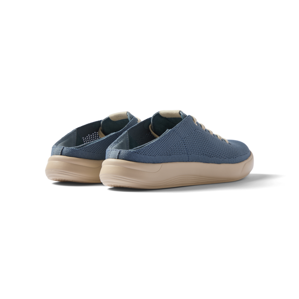 Neptune men's shoes facing away, showing knit upper and cushioned beige sole, beach-inspired comfort and durable design.
