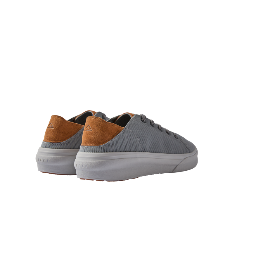 Atlantic men's sneaker showing rear and lateral sides in grey fabric with tan suede heel and white sole, beach-inspired comfort design
