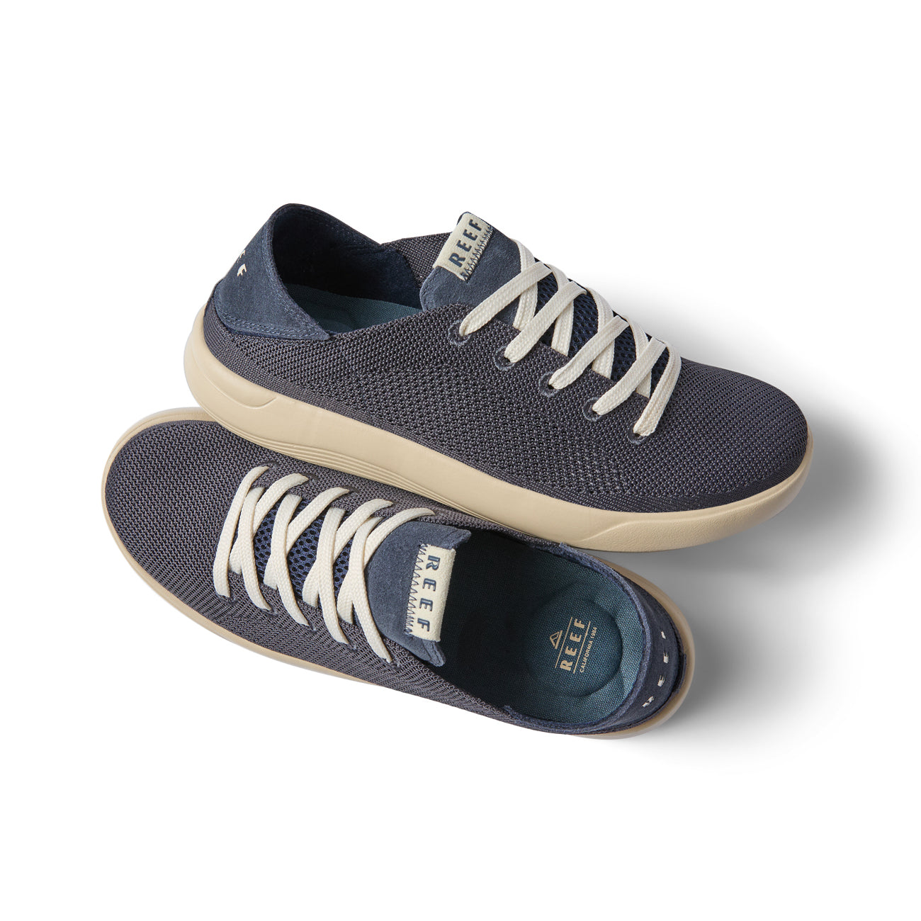 Neptune men's sneaker in true navy facing right, lightweight with cushioned sole and anatomical arch support for beach comfort.