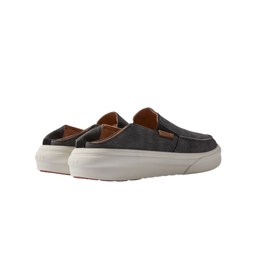 Pacific men's black slip-on shoes facing back right, showcasing cushioned heel and surf-inspired comfortable design.