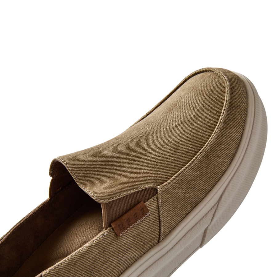 Pacific men’s tan slip-on shoe facing left, close-up of the top and side, surf-inspired comfort footwear