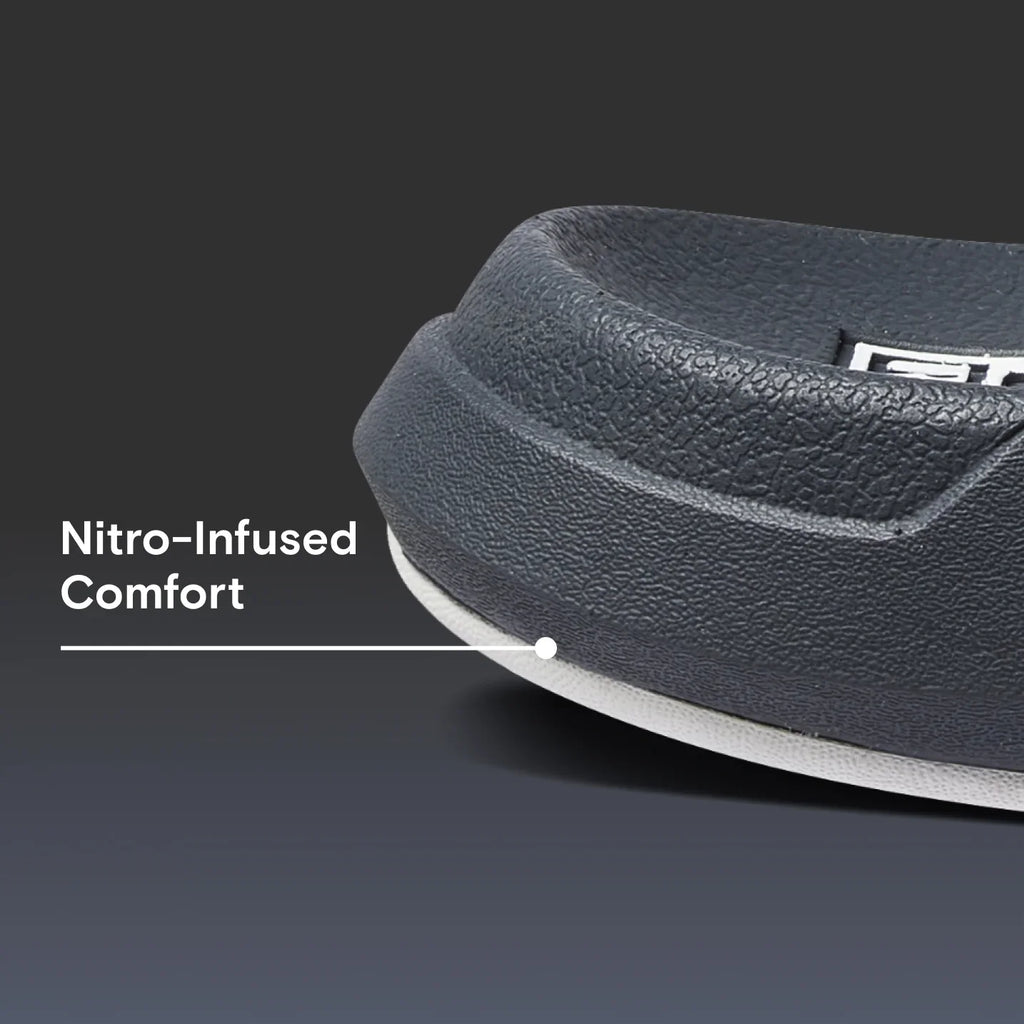 Close-up of the front toe area of Cruiser men's footwear showing textured upper and Nitro-Infused Comfort cushioning.