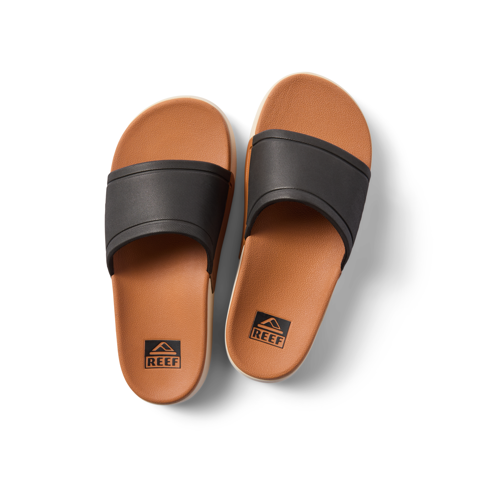 Top view of Sydnee Cutback Low black and tan slides for women, featuring water-friendly design and soft footbed comfort.