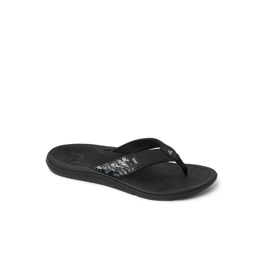 Santa Ana black women's flip flop facing right, featuring soft-rebound cushioning and anatomical arch support for beach comfort.