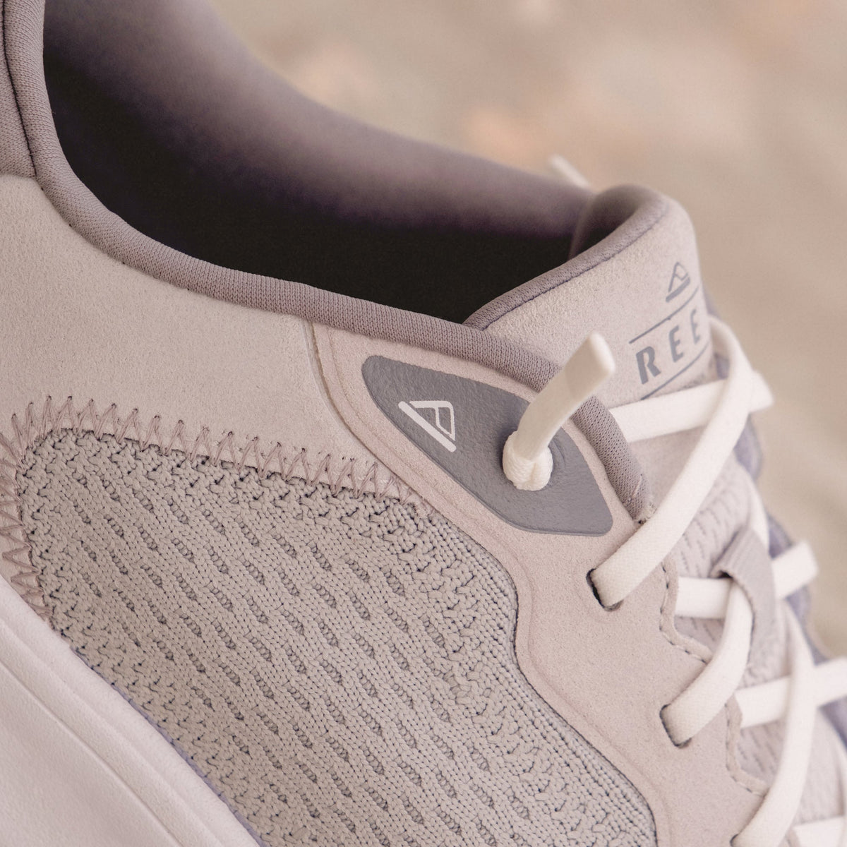 Close-up of the Shoreline Del Mar sneaker in light grey facing right, showing breathable mesh and soft cushioning.