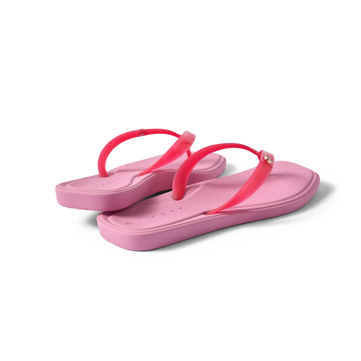 Pair of pink Solaye sandals facing right, featuring water-friendly straps and cushioned footbeds for all-day comfort.