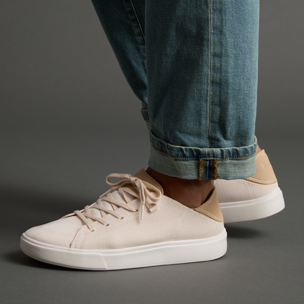 Terramar men's shoe facing right, close-up of lightweight knit upper and cushioned sole, beach-inspired comfort design.