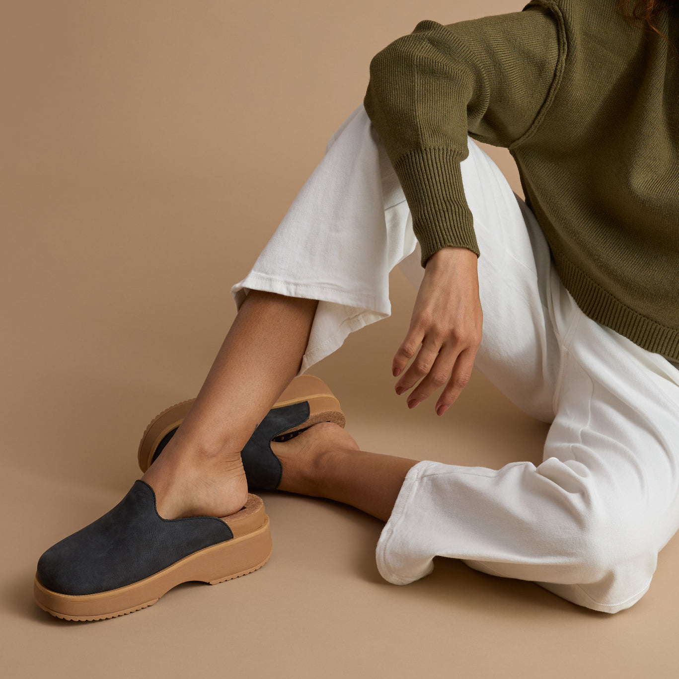 Vista Skye charcoal platform slip-on facing right, close-up of side and top showing comfort and arch support