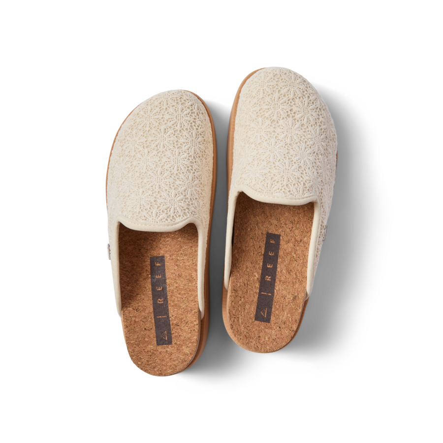 Top view of white Vista Skye women's slip-on shoes with cork footbed, featuring soft cushioning and anatomical arch support.