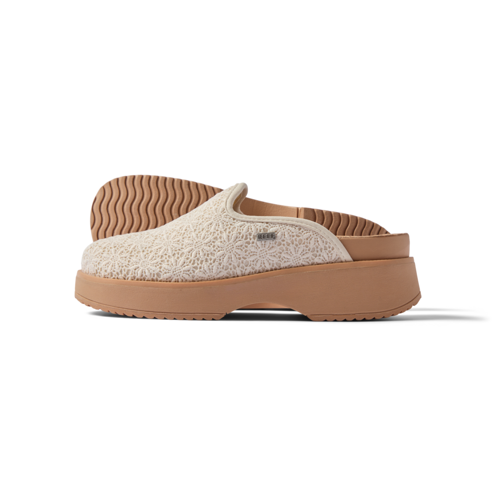 Vista Skye women's white slip-on clog facing left, showing side and sole with soft-rebound cushioning and arch support.