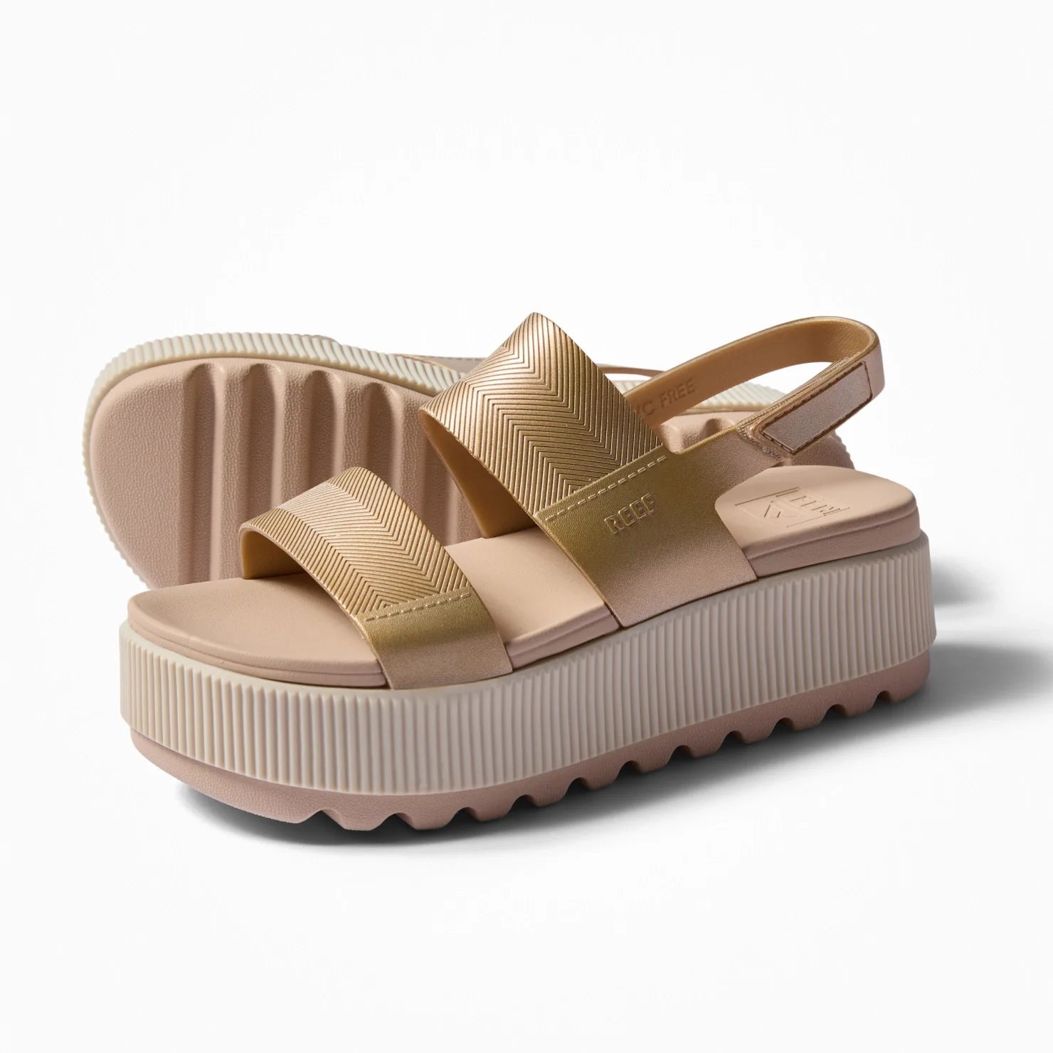 Water Vista Higher women's platform sandal facing left with cushioned sole, arch support, and water-friendly straps in metallic gold.