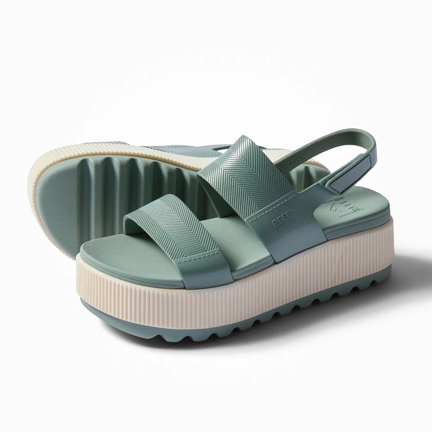 Pair of women's Water Vista Higher sandals in muted green facing right, showing top and sole with molded footbed and arch support.