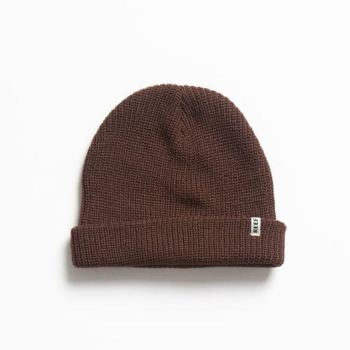 Alyx Beanie in brown knit fabric, close-up front view showing soft texture, designed for comfort and beach lifestyle.
